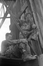 "Roustabouts during a lull in painting of derrick. Seminole oil field, Oklahoma"; Russell Lee, photographer; Farm Security Administration - Office of War Information Photograph Collection; Library of Congress, Prints and Photographs Division, Washington, D.C. (1939); https://www.loc.gov/resource/fsa.8a26942/
