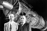 Gerhard Neumann (left) and Neil Burgess pose with a J79 turbojet, which earned them a Collier Trophy in 1958.