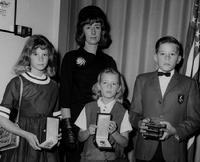 Major Roy J. Blakeley Awards Presentation, Dyess Air Force Base, Abilene, Texas (Karen - 9 years old; Sharon - 8 years old; Larry - 11 years old;  and Johnnye L. Blakeley - 30 years old; October 21, 1965)