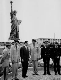 Officials attending the inauguration of the Statue of Liberty replica; Chaumont Air Base, Chaumont, France (July 4, 1956)