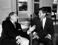 President John F. Kennedy (seated in fabric-covered rocking chair) meets with General Douglas MacArthur. Oval Office, White House, Washington, D.C. (July 20, 1961)
