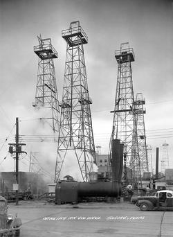 Drilling an Oil Well in Town; Kilgore, Texas