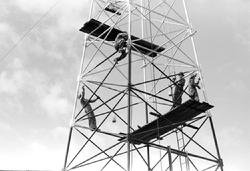 "Roustabouts painting an oil well, Seminole oil fields, Oklahoma"; Russell Lee, photographer; Farm Security Administration - Office of War Information Photograph Collection; Library of Congress, Prints and Photographs Division, Washington, D.C. (1939); https://www.loc.gov/item/2017740866/